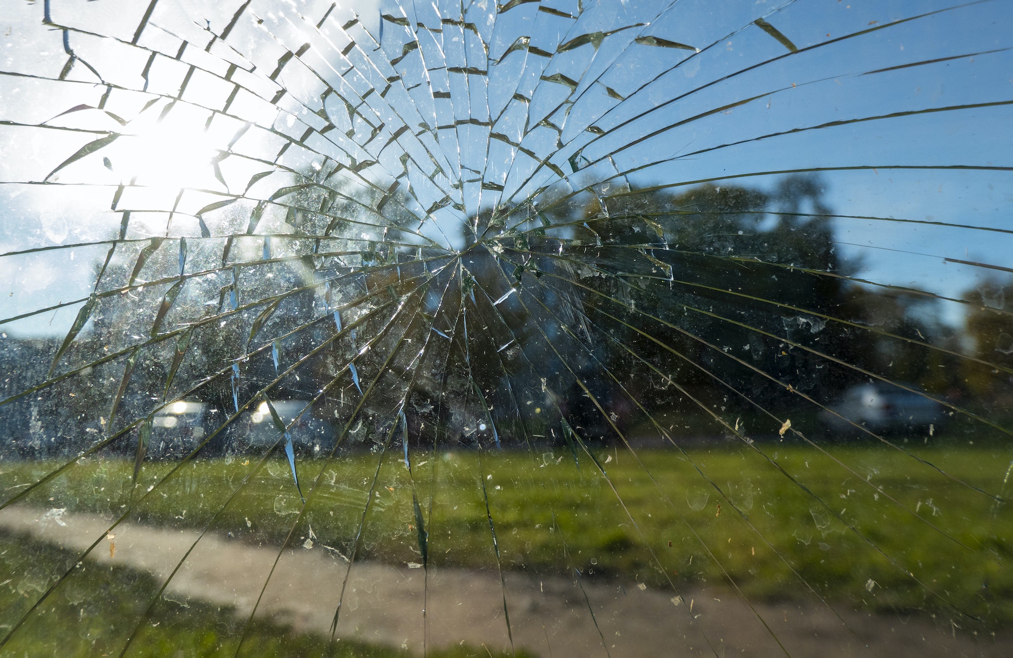 Broken glass at a street bus stop